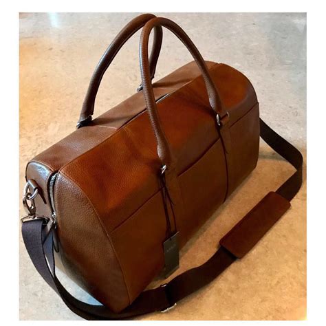 marks and spencer leather holdall.